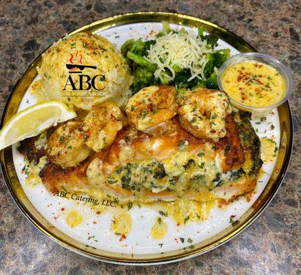 Stuffed salmon topped with sautéed shrimp, sautéed broccoli, risotto rice and LOVE sauce