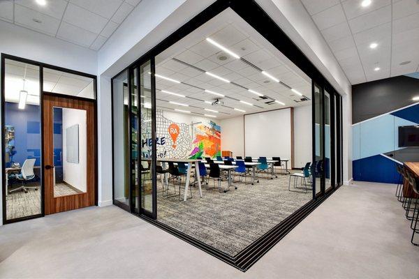 Welcome to Realty Austin's North Office, enjoy a learning session in our modern and collaborative training room.