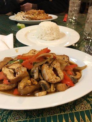 Tofu cashew stir fry in front and tofu pad Thai in back