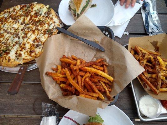 Pizza with Gorgonzola and apples, fresh cut fries, hamburger