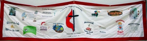 A banner showing how this church is active in the local community.