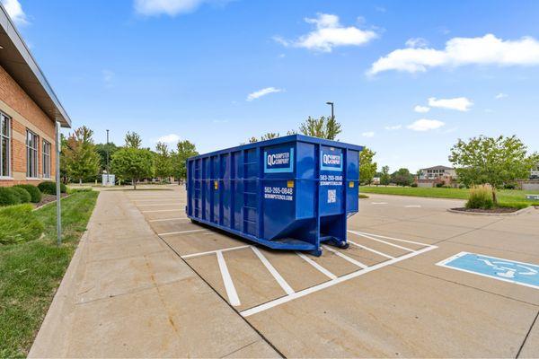 Durable roll-off dumpsters in Davenport placed at a commercial job site by QC Dumpster Company.