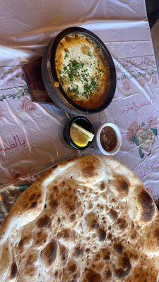 Fahstah- sizzling shredded beef with spices and bread