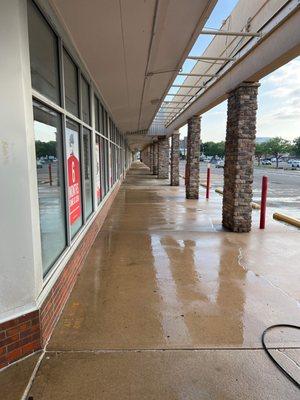 Pressure washing and window washing for shopping centers