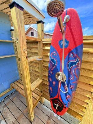 Surfboard showers made in house.