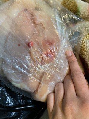 Blood all over the meat from the dirty cutting surface