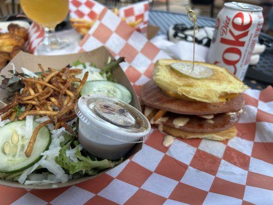 Fried bologna sandwich and side salad.