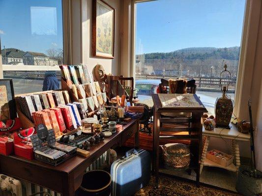 Large selection of incense surrounded by old odds and ends.