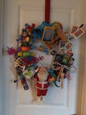 Old toys made into a wreath.