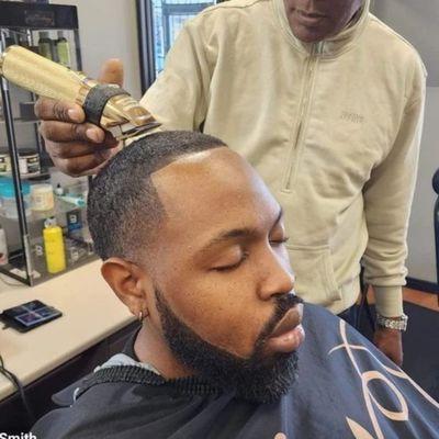 Low taper fade with beard enhancements