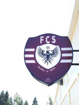 Look for our sign and our door is right under it!