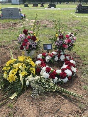 Red and white heart flowers with little red cardinals