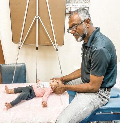 Baby Madelyn (my daughter) she's currently 2.5 months old being adjusted for tilted neck