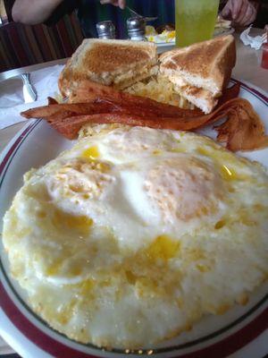 Three Eggs, bacon and Texas Toast. Wonderful Wonderful food.