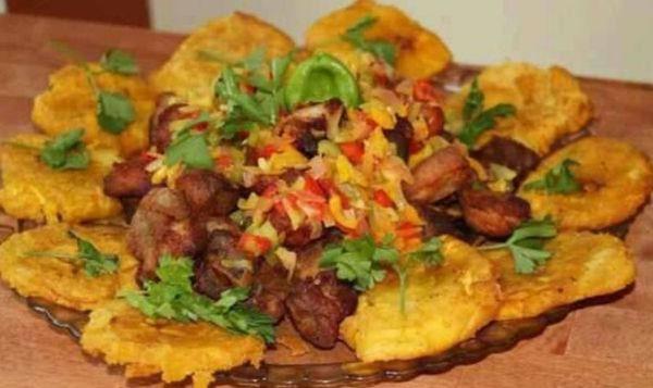 Fried Pork, pressed plantains, Haitian Pickled.