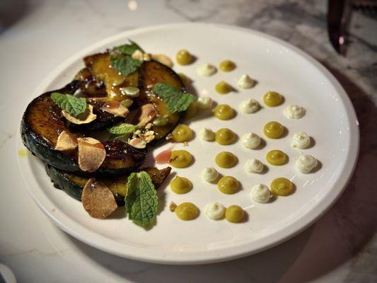 Zucca in Agradolce - such a unique dish - kabocha squash with a umami-ish glaze with crispy garlic and fresh mint. Beautiful!