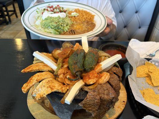 Molcajete - comes with rice, beans, toppings, and 3 tortillas