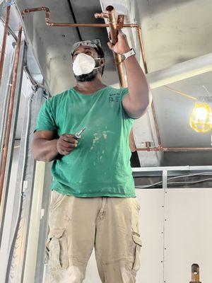 Installing water lines on a commercial project.