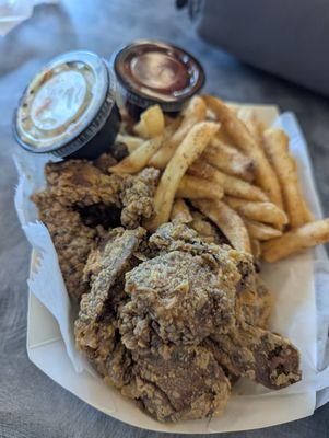 Fried liver. I thought it was a side but WOW!  Generously sized with a light crispy breading served hot outta the fryer.  Yum!