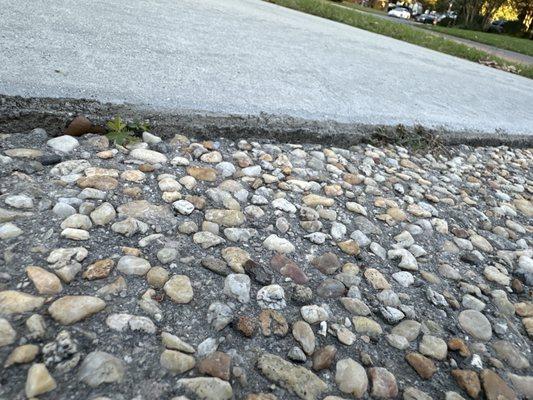 Concrete shifted level in the middle of the driveway