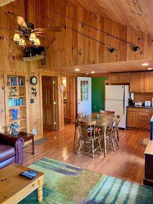 Kitchen with microwave, stove, oven, refrigerator, etc. Mudroom entrance for gear.