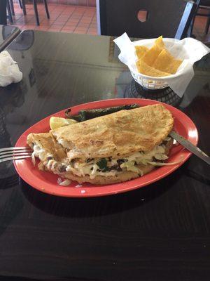 They're known for their Huge corn tortilla Quesadillas You can add your choice of meat .