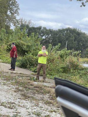 The aggressor was the man in the green shirt pictured here.