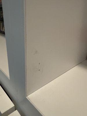 Those are not stains, they are holes left by 3 D laminate company