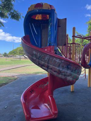 Playground Not in the best shape. The shade from the tree is nice at least.