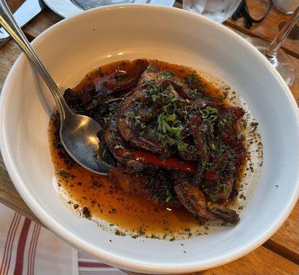 Shrimp & Chorizo - peppers, onions, chorizo, Cajun honey garlic sauce, over a fried grits cake