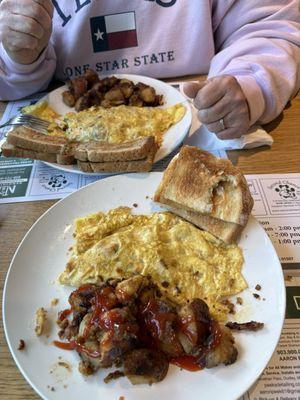 Western Omelette, Ham & Cheese Omelette, home-fries and toast.
