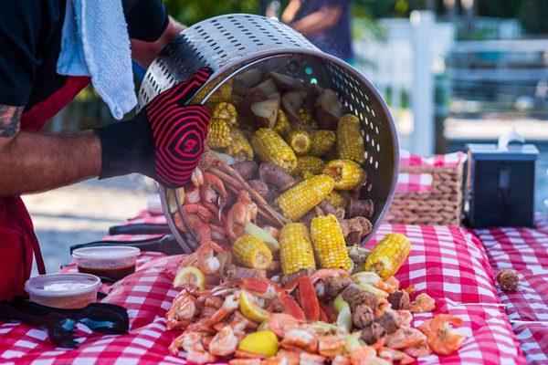 Our Signature Seafood Boil and famous Outer Banks Boil Company "pour"