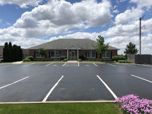 Dental office building with ample parking.