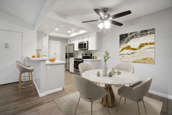 Distinct dining area with ceiling fan