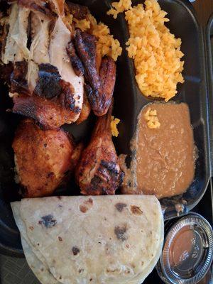 Half chicken bundle with flour tortilla and mild salsa