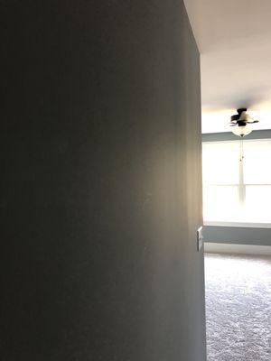 Shoddy drywell work - waves in the walls for days