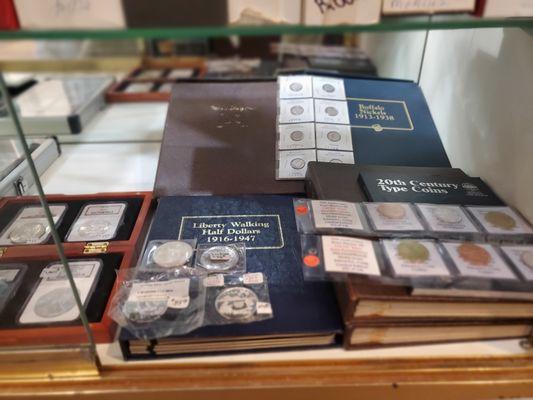 A very large selection of coin albums that are available either empty, partially filled or complete sets.