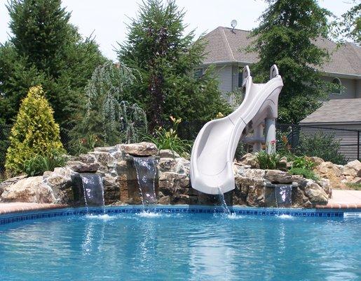 Custom slide / natural stone waterfall