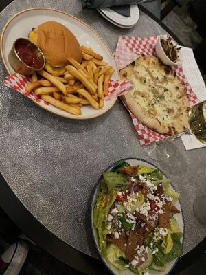 Burger, Fattoush Salad, Fungi pizza with shrooms on the side