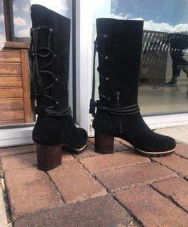 These Sorel boots are genius!!  The lace up in back allows for you to adjust for big or small calves.  Plus  it is so cute and comfortable.