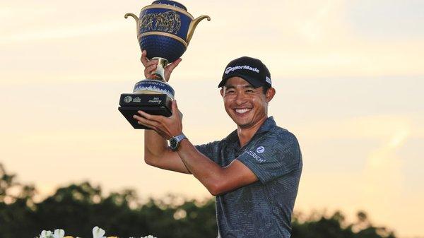Collin Morikawa holds the WGC-Workday Championship trophy after winning the 2021 edition at The Concession.