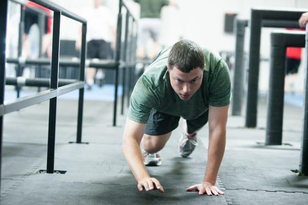 Bear crawling during Strength Efficiency class.