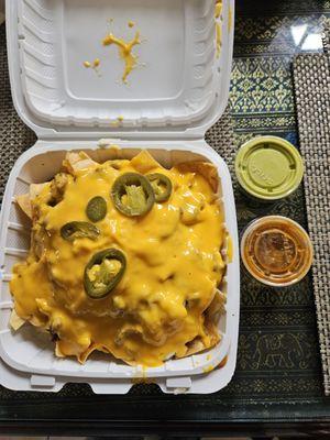 Nachos with asada and barely any jalapeno