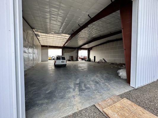 60x80 red iron building built for sun haven farms to extend their shop space