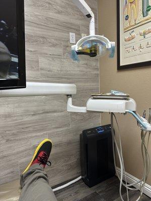 Having an X-ray done and adjusting my root canal tooth.