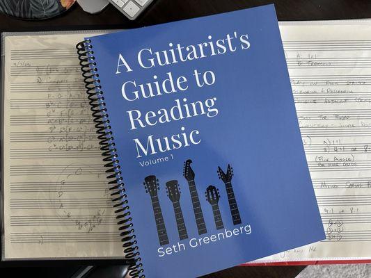 Dr. G's music book and music he's helped my write out along with guitar exercises.
