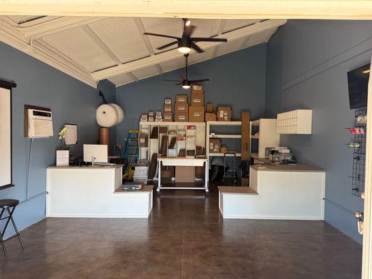 Interior of Postal Shack Maui. Front desk, Boxes ect.