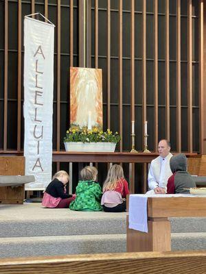 Pastor Benjamin giving a Children's Message.