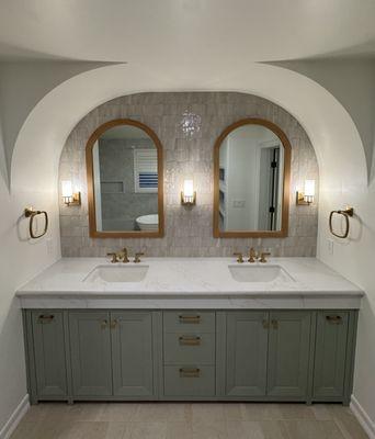 Handmade tiles, custom arch and vanity in a master bathroom remodel