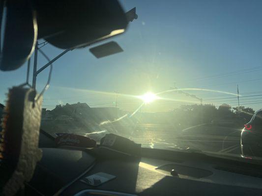 You can't super tell, but there is grease all over my windshield making it so HARD to see out of with the sun!!